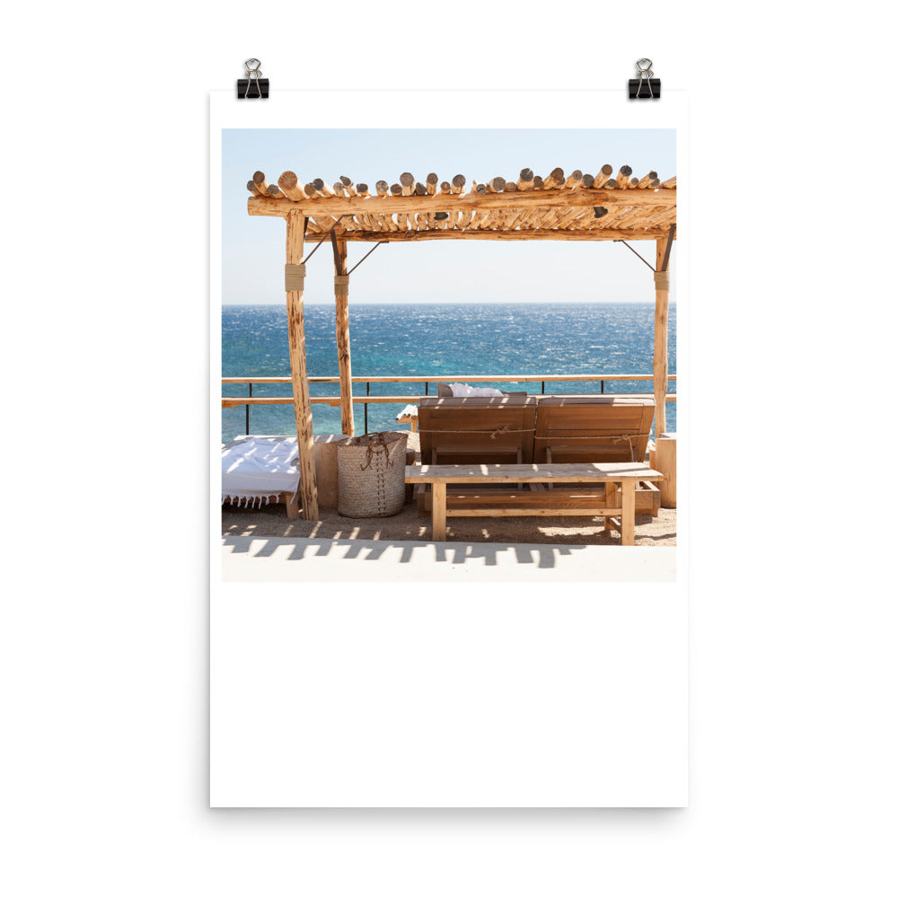 Wall art color photography print poster of a beach chair overlooking the ocean in Paraga, Mykonos, Greece